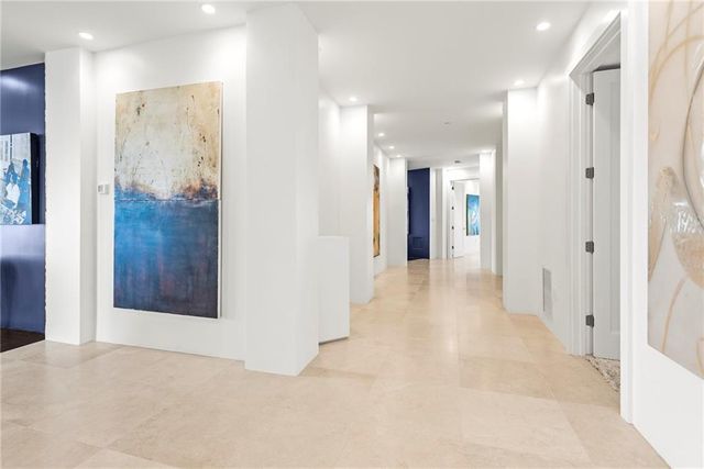 a living room with furniture a window and a fireplace