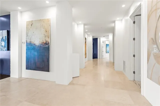 a living room with furniture a window and a fireplace