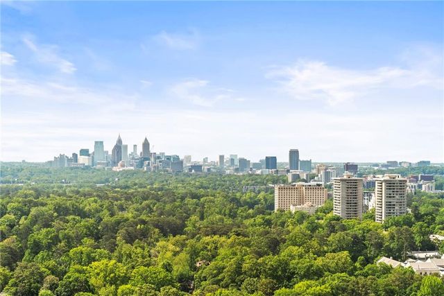 a view of a city with tall buildings