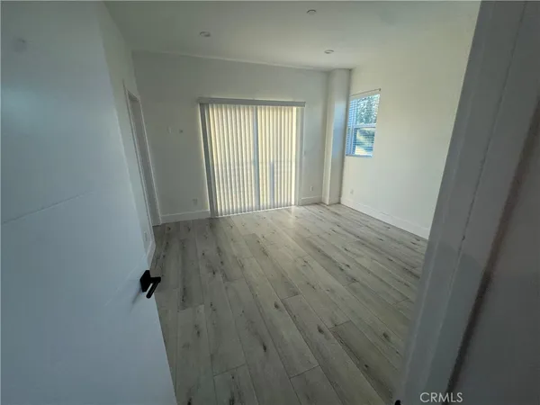 a en suite bathroom with a sink a toilet and a mirror