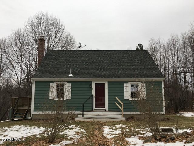 4 Bryan Road Middlefield, MA 01011 - Photo 1 of 29 a front view of a house with garden