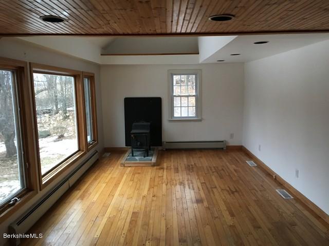4 Bryan Road Middlefield, MA 01011 - Photo 11 of 29 a view of wooden floor in an empty room with a window