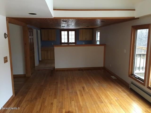 4 Bryan Road Middlefield, MA 01011 - Photo 12 of 29 wooden floor in an empty room with a window