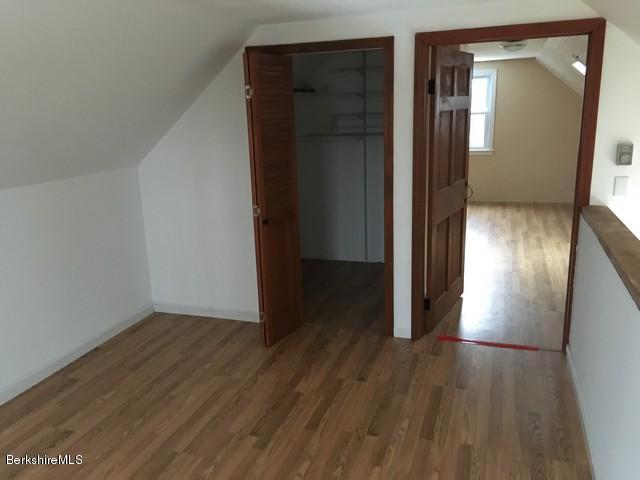 4 Bryan Road Middlefield, MA 01011 - Photo 16 of 29 a view of a hallway with wooden floor