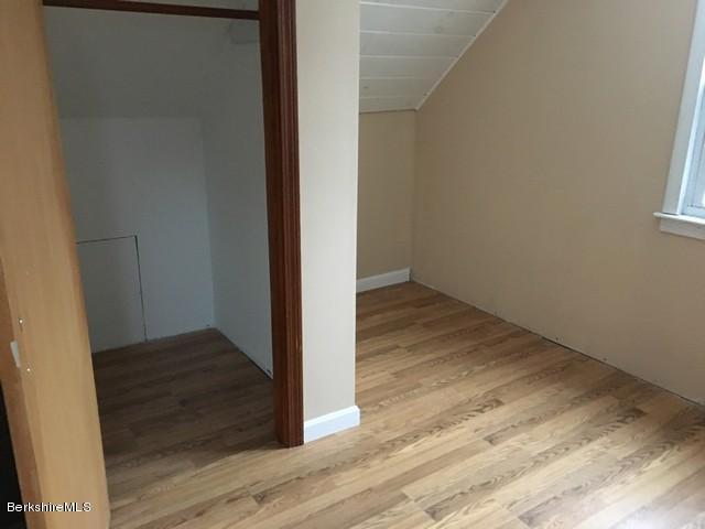 4 Bryan Road Middlefield, MA 01011 - Photo 18 of 29 an empty room with wooden floor