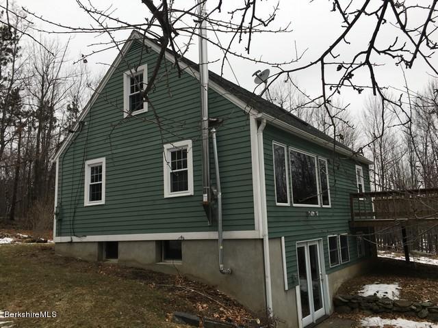 4 Bryan Road Middlefield, MA 01011 - Photo 5 of 29 a front view of a house with garage