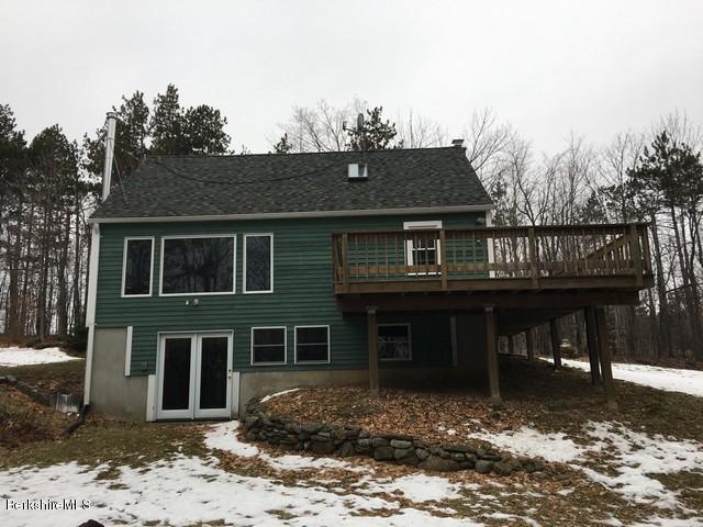 4 Bryan Road Middlefield, MA 01011 - Photo 7 of 29 a front view of a house with a yard
