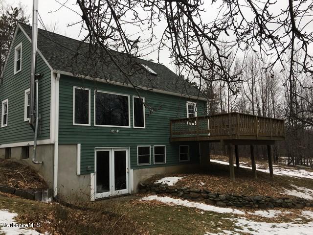 4 Bryan Road Middlefield, MA 01011 - Photo 8 of 29 a front view of a house with a yard