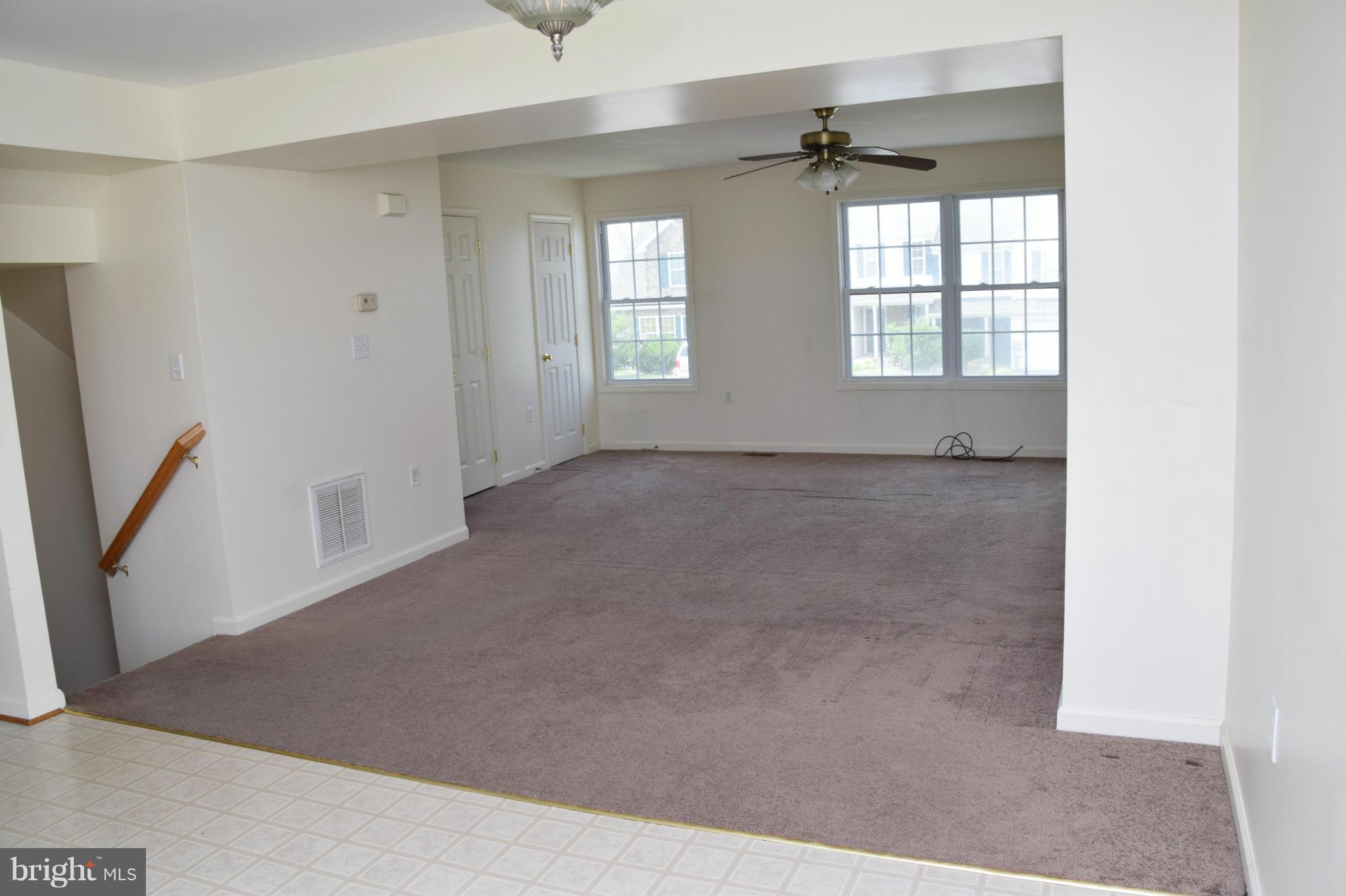 25 Fuzzy Tail Drive Ranson, WV 25438 - Photo 17 of 25 an empty room with windows and closet