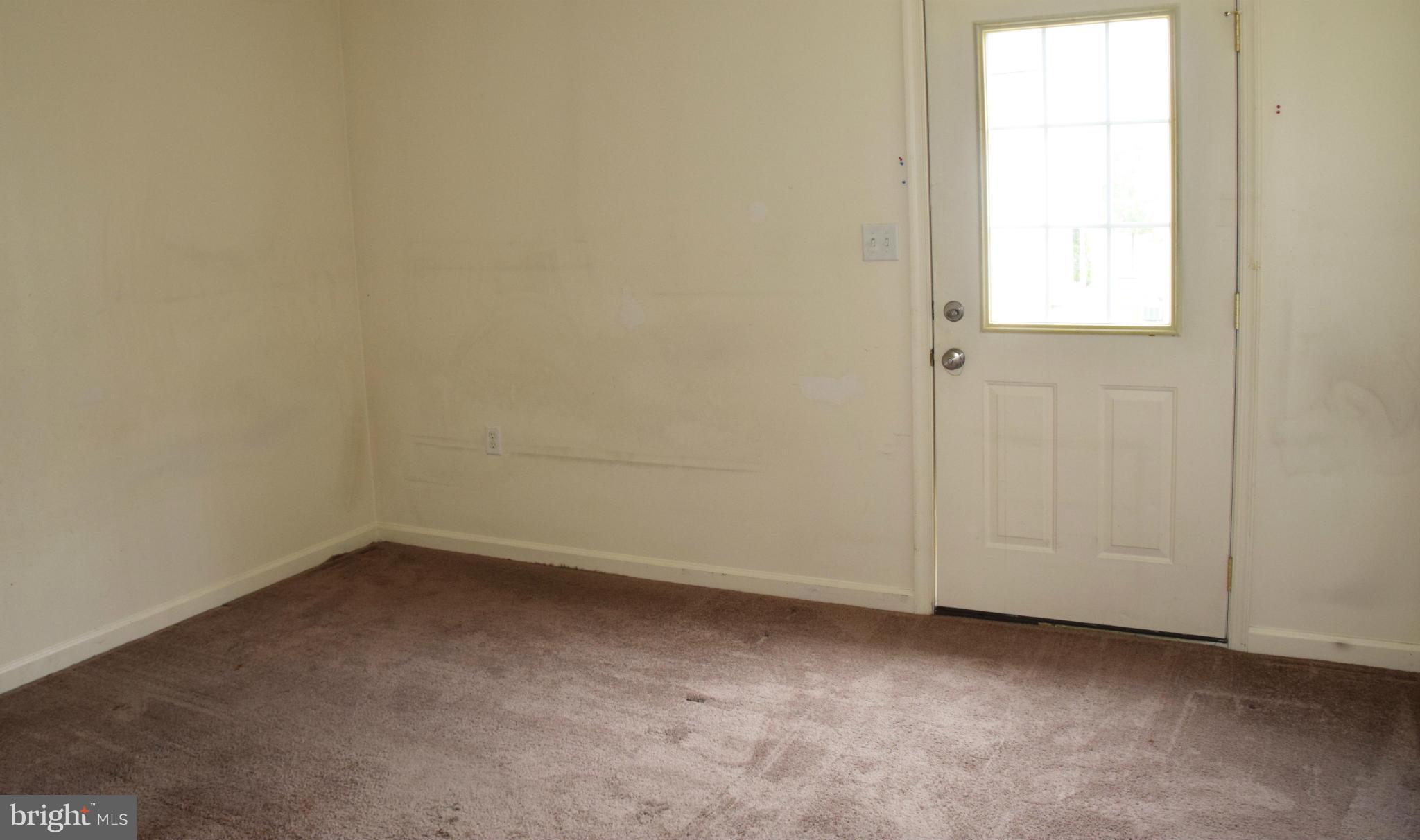 25 Fuzzy Tail Drive Ranson, WV 25438 - Photo 8 of 25 an empty room with a window
