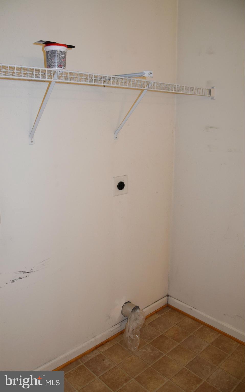 25 Fuzzy Tail Drive Ranson, WV 25438 - Photo 9 of 25 a view of a room with racks on the wall