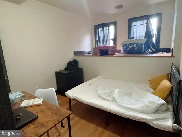 a dining room with table and chairs