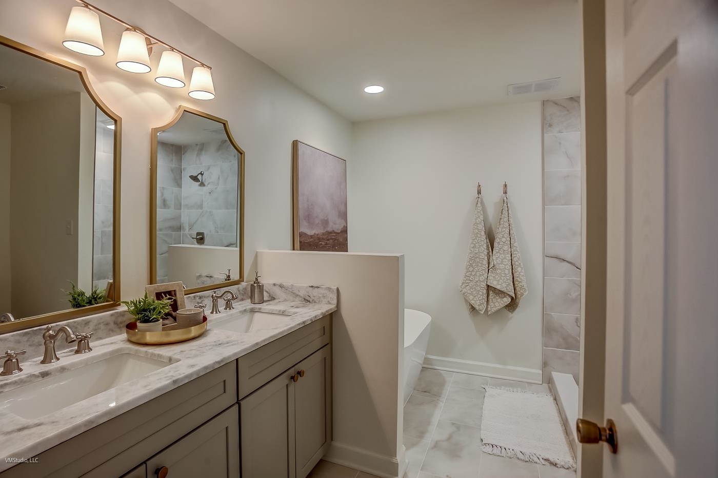 7578 Apple Valley Road Germantown, TN 38138 - Photo 11 of 22 Bathroom with dual vanity, tile patterned floors, and independent shower and bath