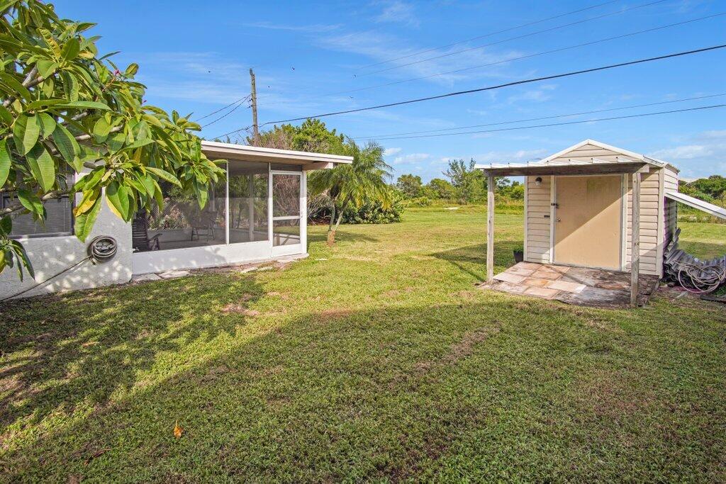 406 Elizabeth Road Lake Worth, FL 33461 - Photo 38 of 44 Sideyard and Shed