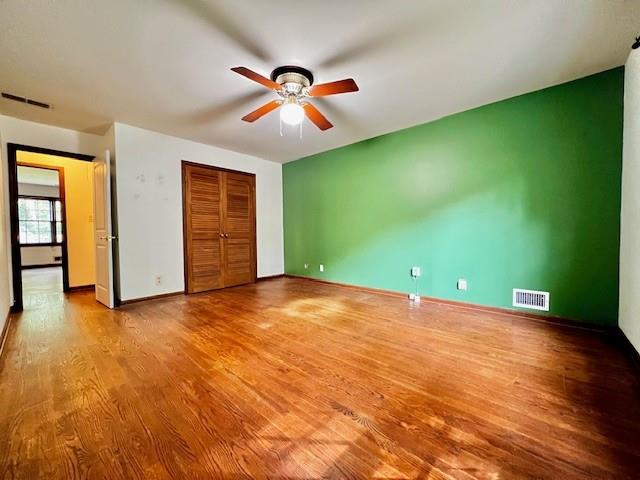 4541 Arcado Road Southwest Lilburn, GA 30047 - Photo 9 of 16 a view of an empty room with window and chandelier fan