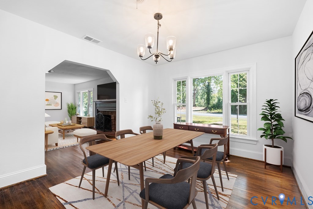 579 Stokes Road Farmville, VA 23901 - Photo 15 of 49 a view of a dining room with furniture window and wooden floor