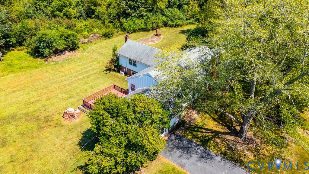 579 Stokes Road Farmville, VA 23901 - Photo 2 of 49 a view of a yard with plants and large trees