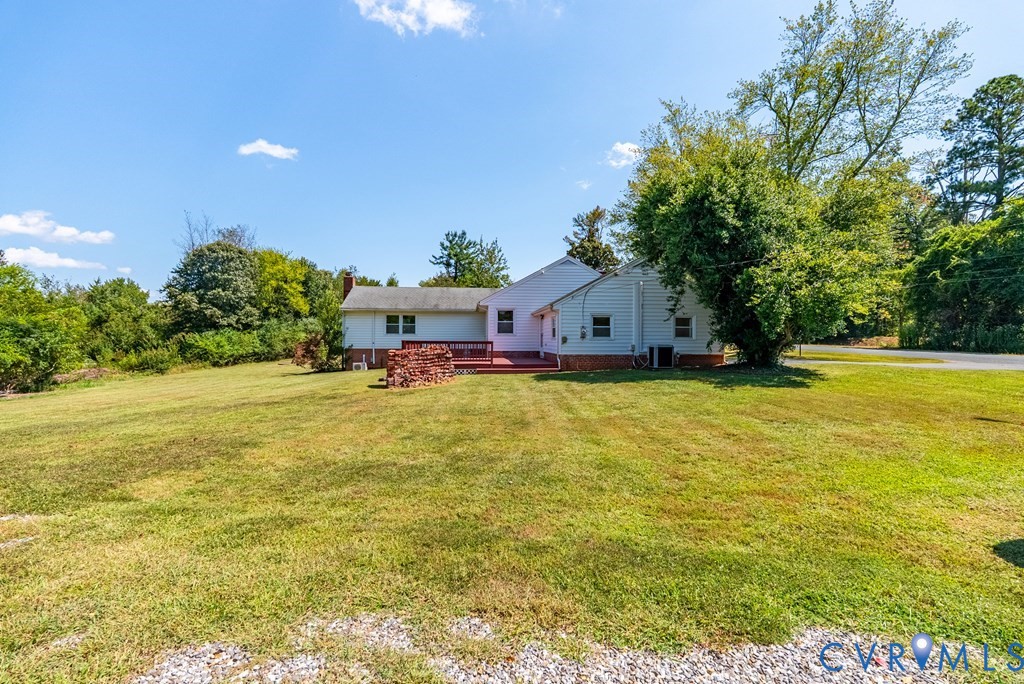 579 Stokes Road Farmville, VA 23901 - Photo 25 of 49 a view of a swimming pool with an outdoor space and seating area