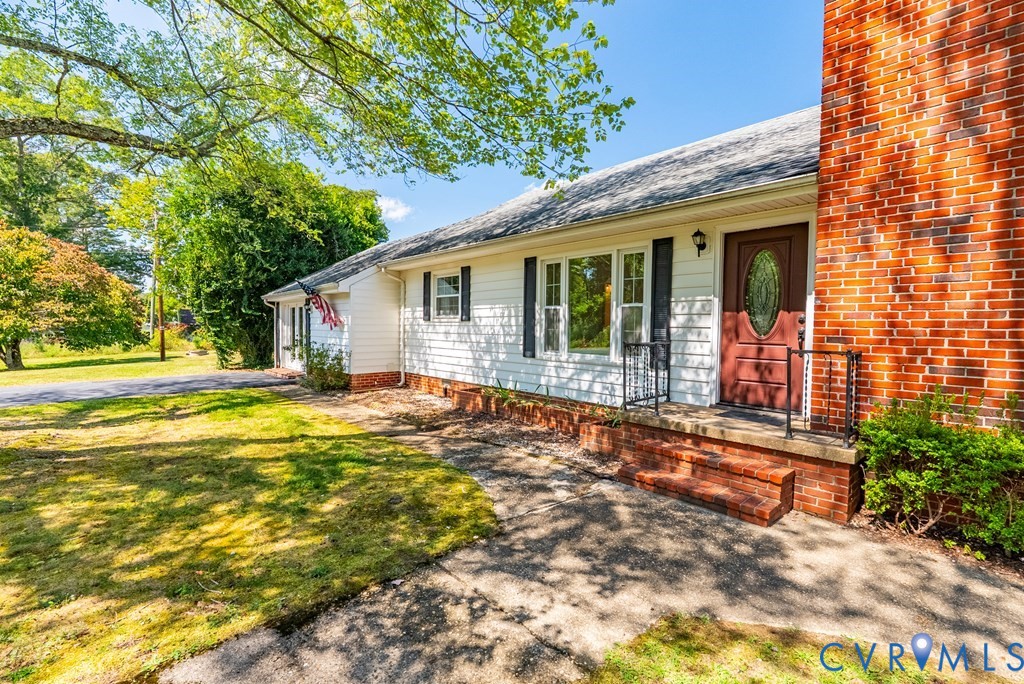 579 Stokes Road Farmville, VA 23901 - Photo 35 of 49 a view of a house with pool and garden