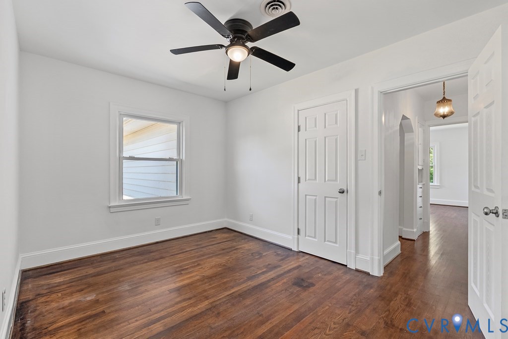 579 Stokes Road Farmville, VA 23901 - Photo 48 of 49 wooden floor in an empty room with a window