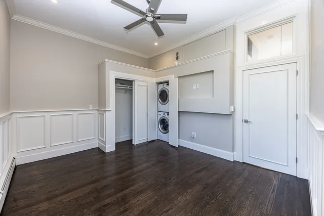a view of livingroom with washer and dryer