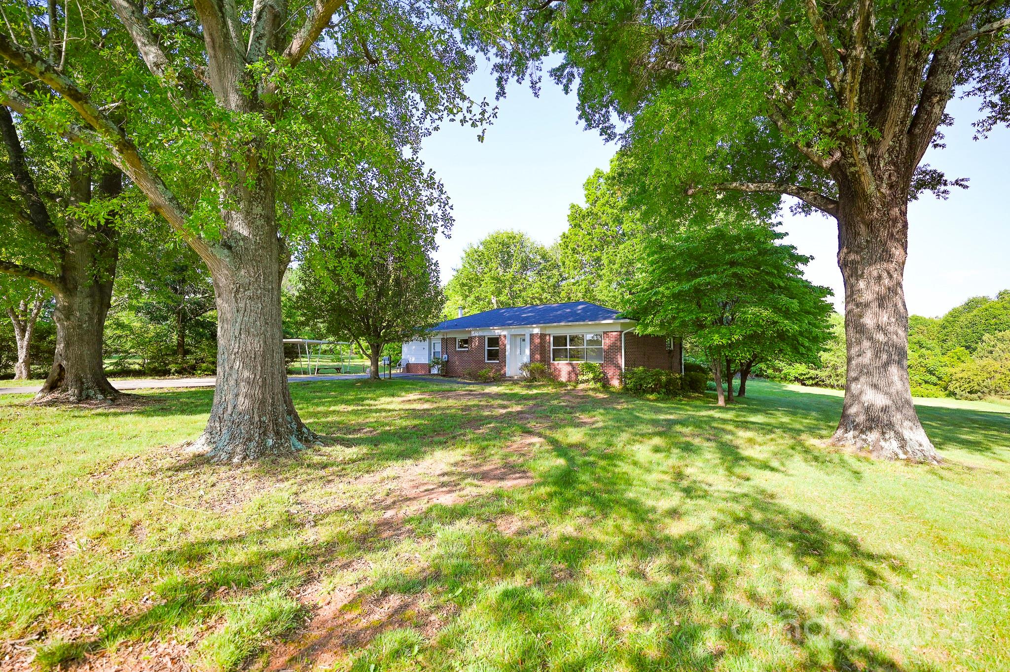 774 Poors Ford Road Rutherfordton, NC 28139 - Photo 2 of 25 a view of a house with a yard