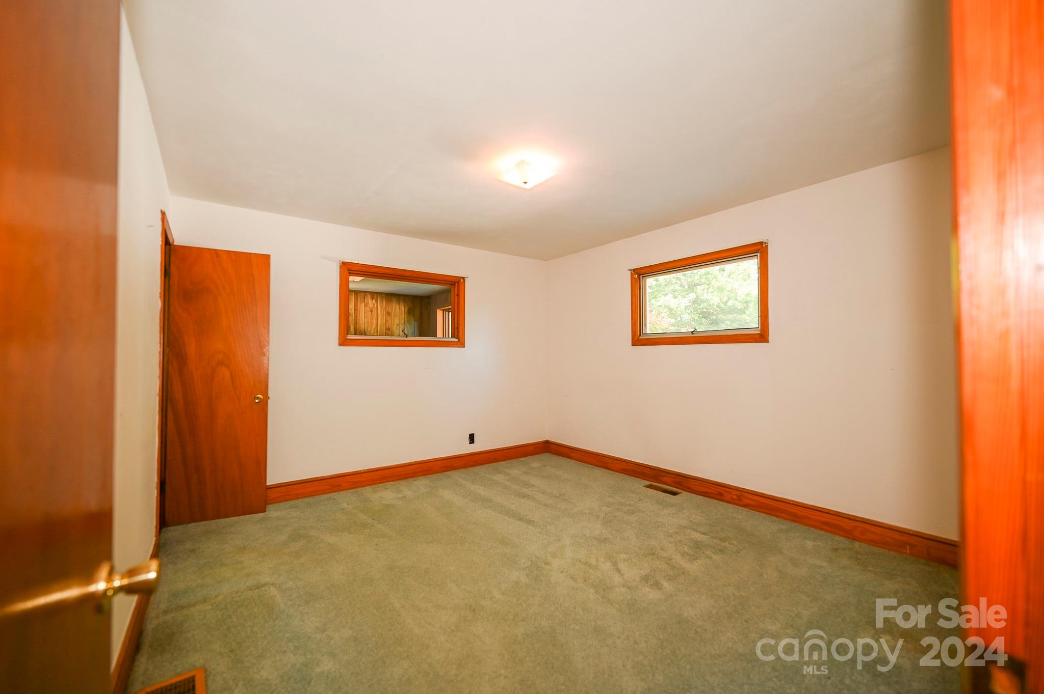 774 Poors Ford Road Rutherfordton, NC 28139 - Photo 21 of 25 an empty room with windows