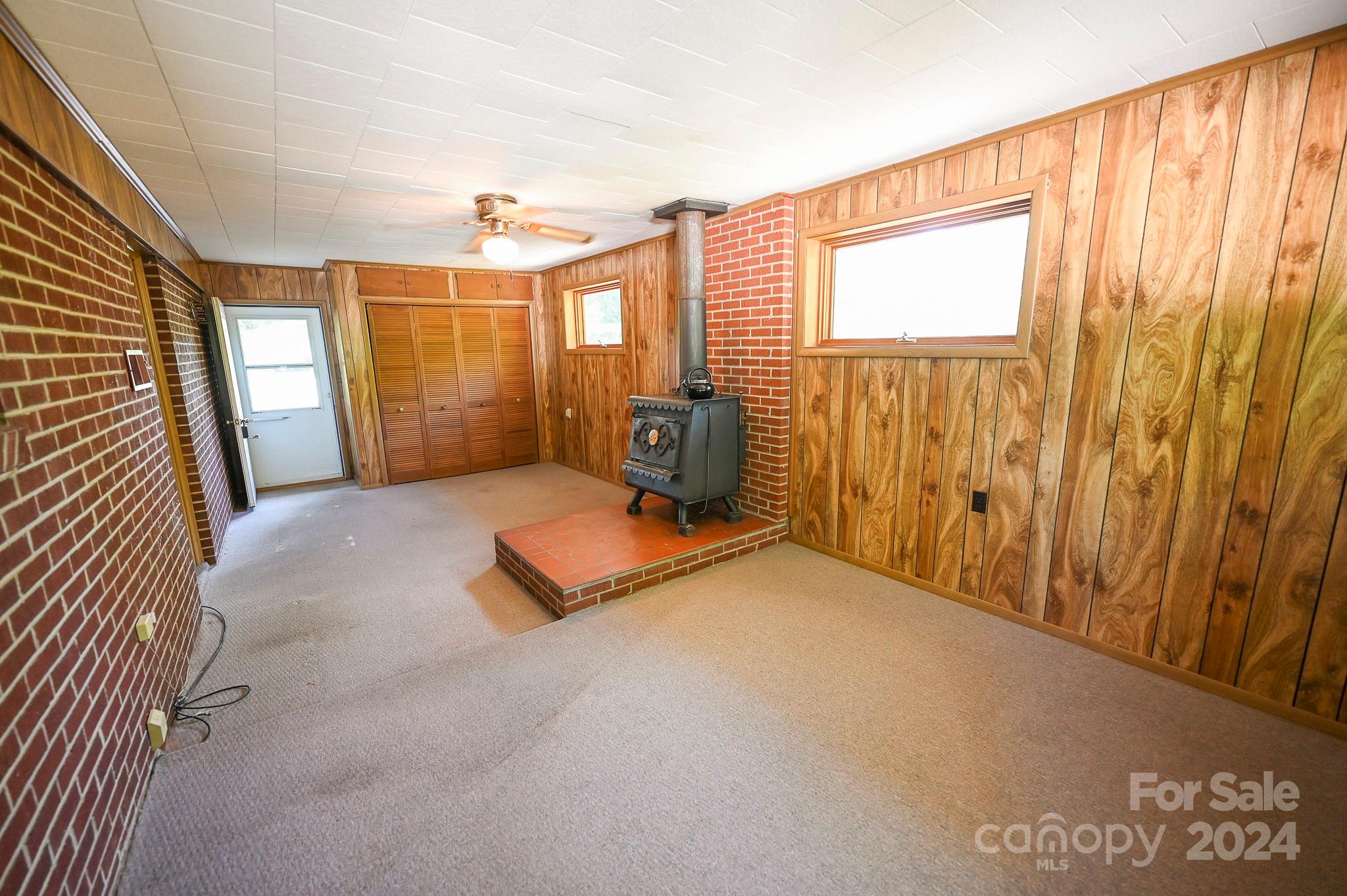 774 Poors Ford Road Rutherfordton, NC 28139 - Photo 23 of 25 a bedroom with furniture and large window