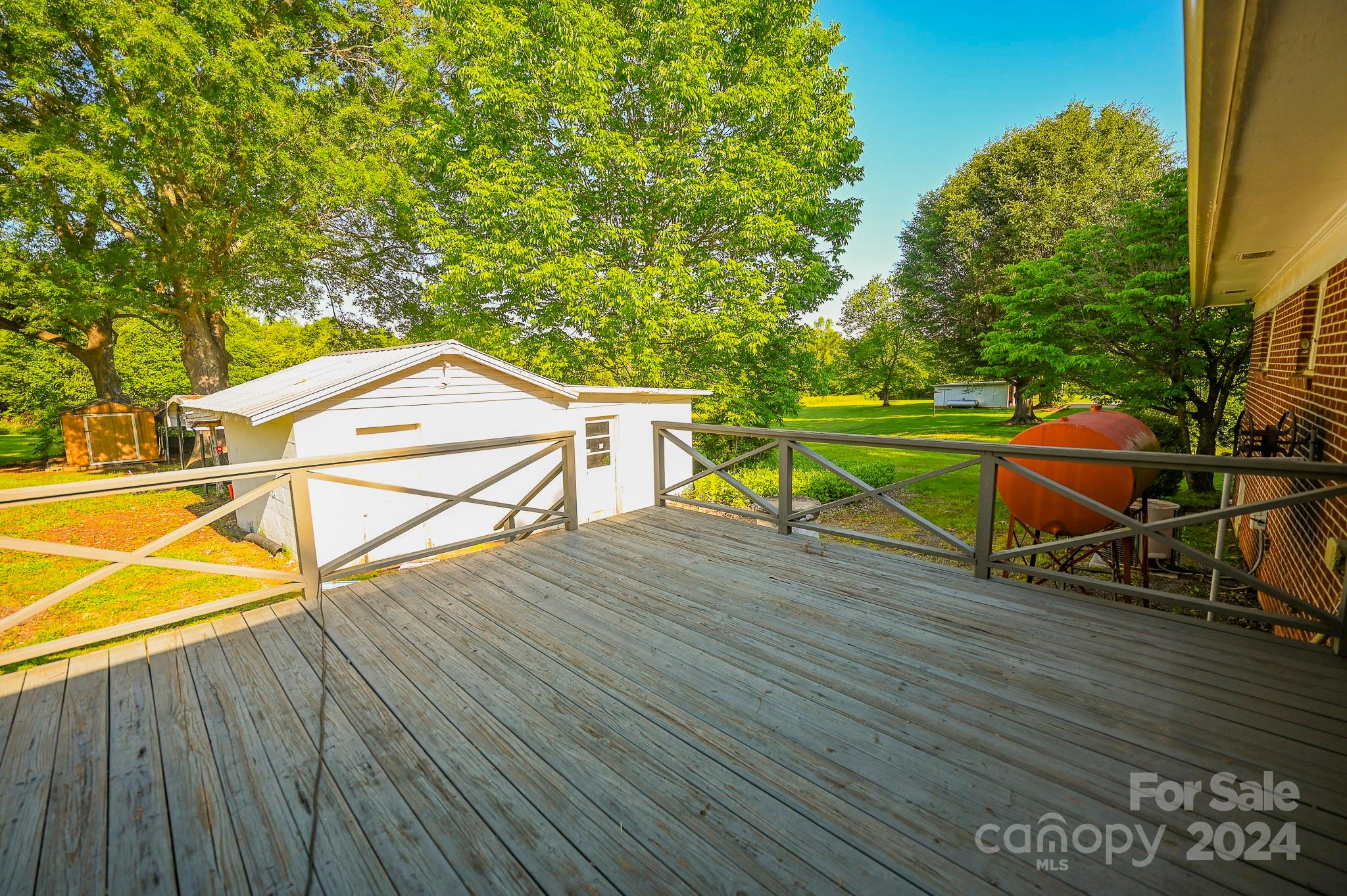 774 Poors Ford Road Rutherfordton, NC 28139 - Photo 24 of 25 an outdoor space with wooden benches