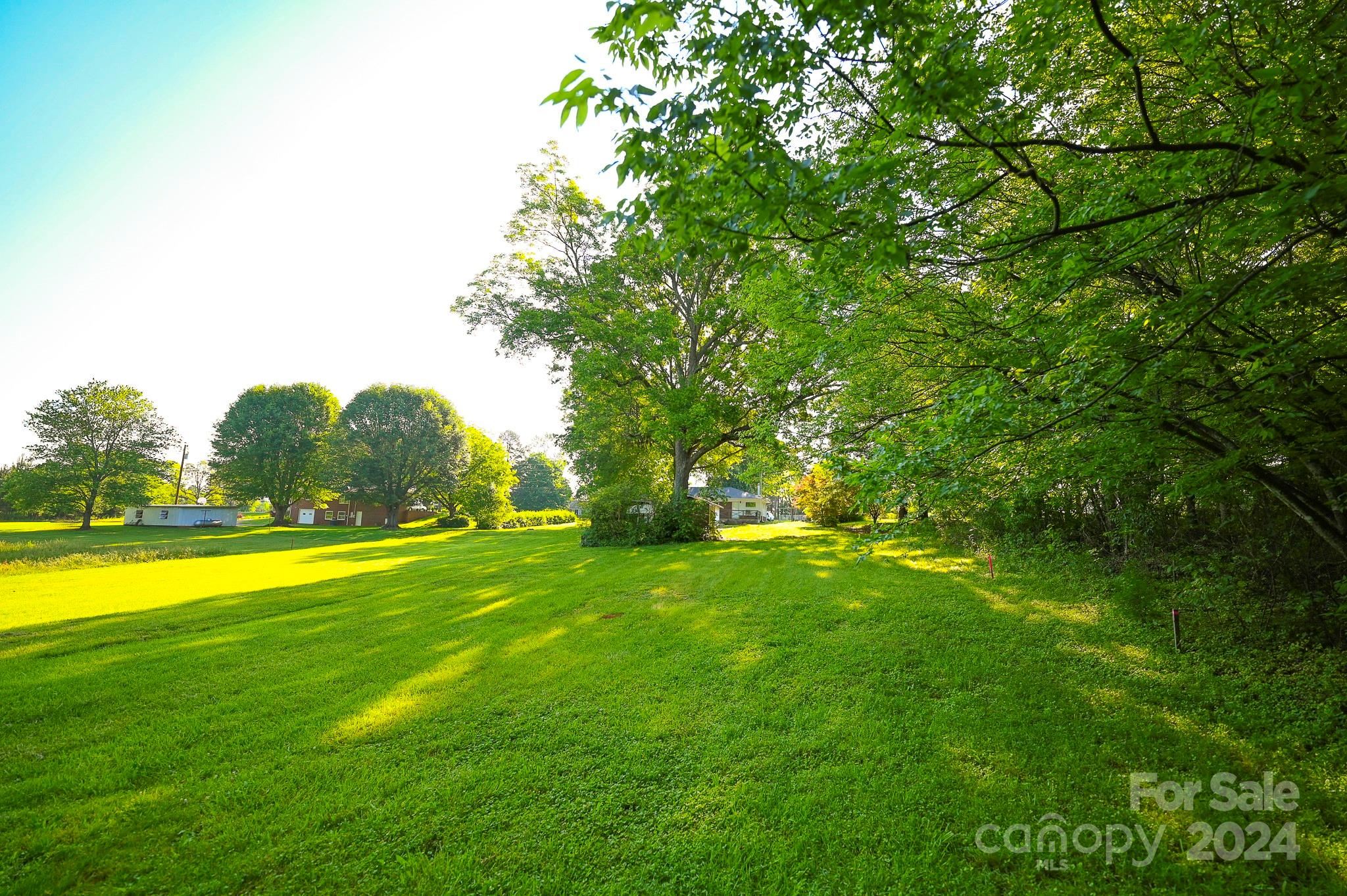 774 Poors Ford Road Rutherfordton, NC 28139 - Photo 4 of 25 a view of a big yard with swimming pool and green space