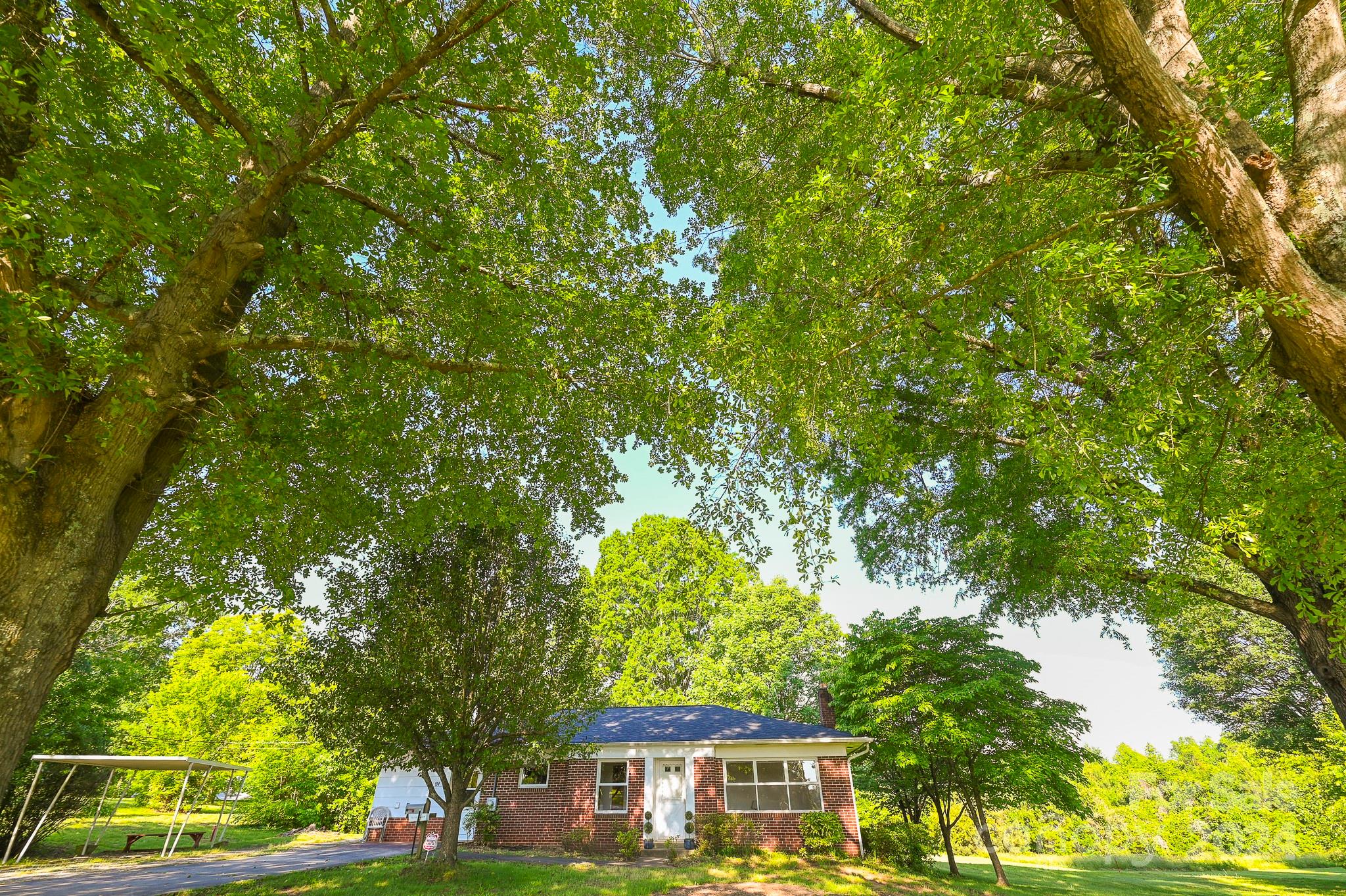 774 Poors Ford Road Rutherfordton, NC 28139 - Photo 8 of 25 a front view of a house with a yard
