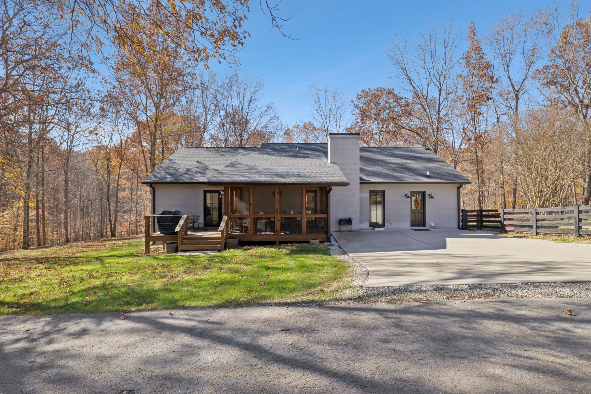 7340 Bradford Road Primm Springs, TN 38476 - Photo 2 of 36 a view of a house with swimming pool and sitting area