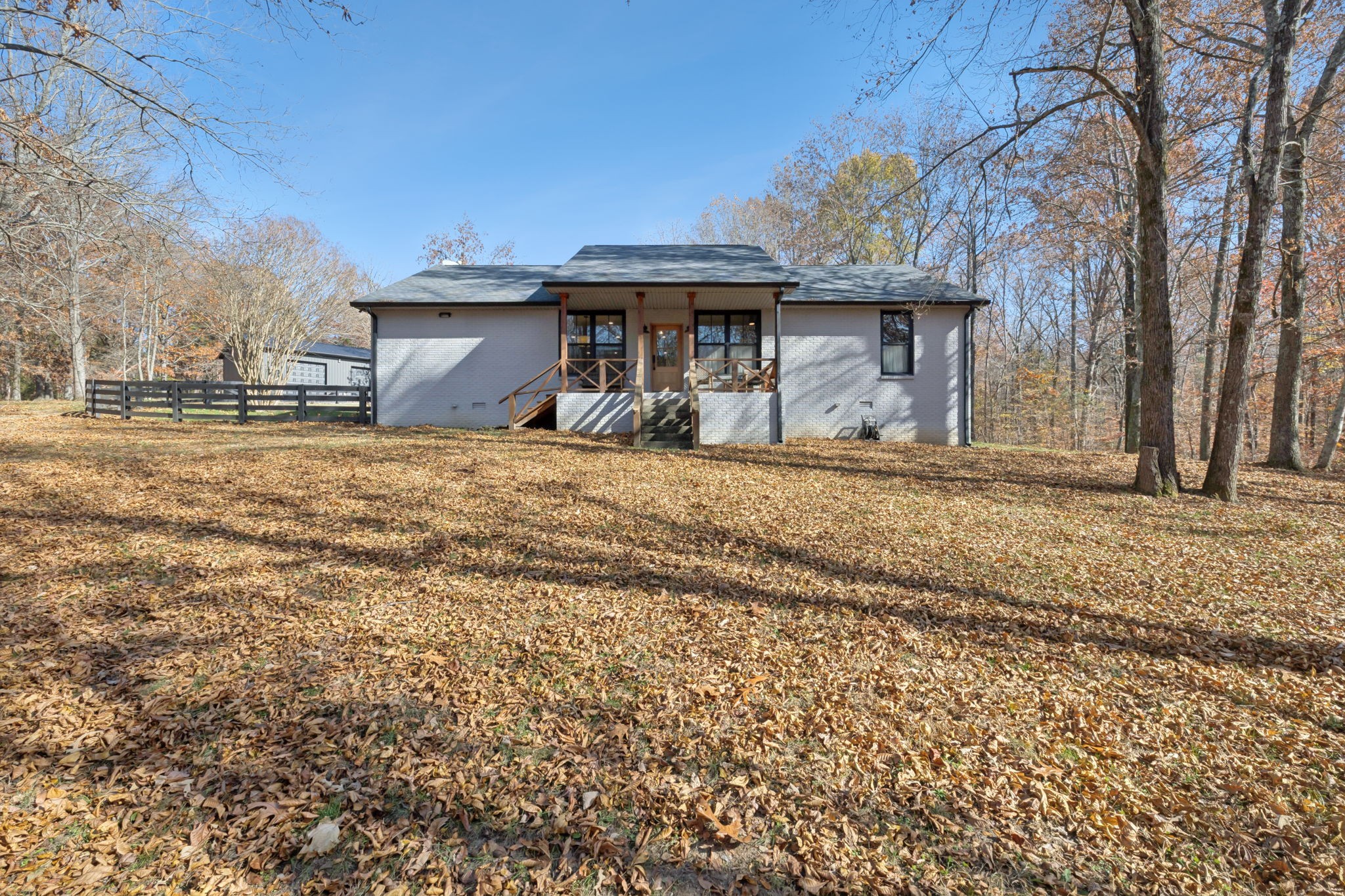 7340 Bradford Road Primm Springs, TN 38476 - Photo 29 of 36 a front view of a house with a yard