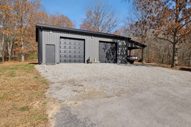 a view of a house with a outdoor space and shower