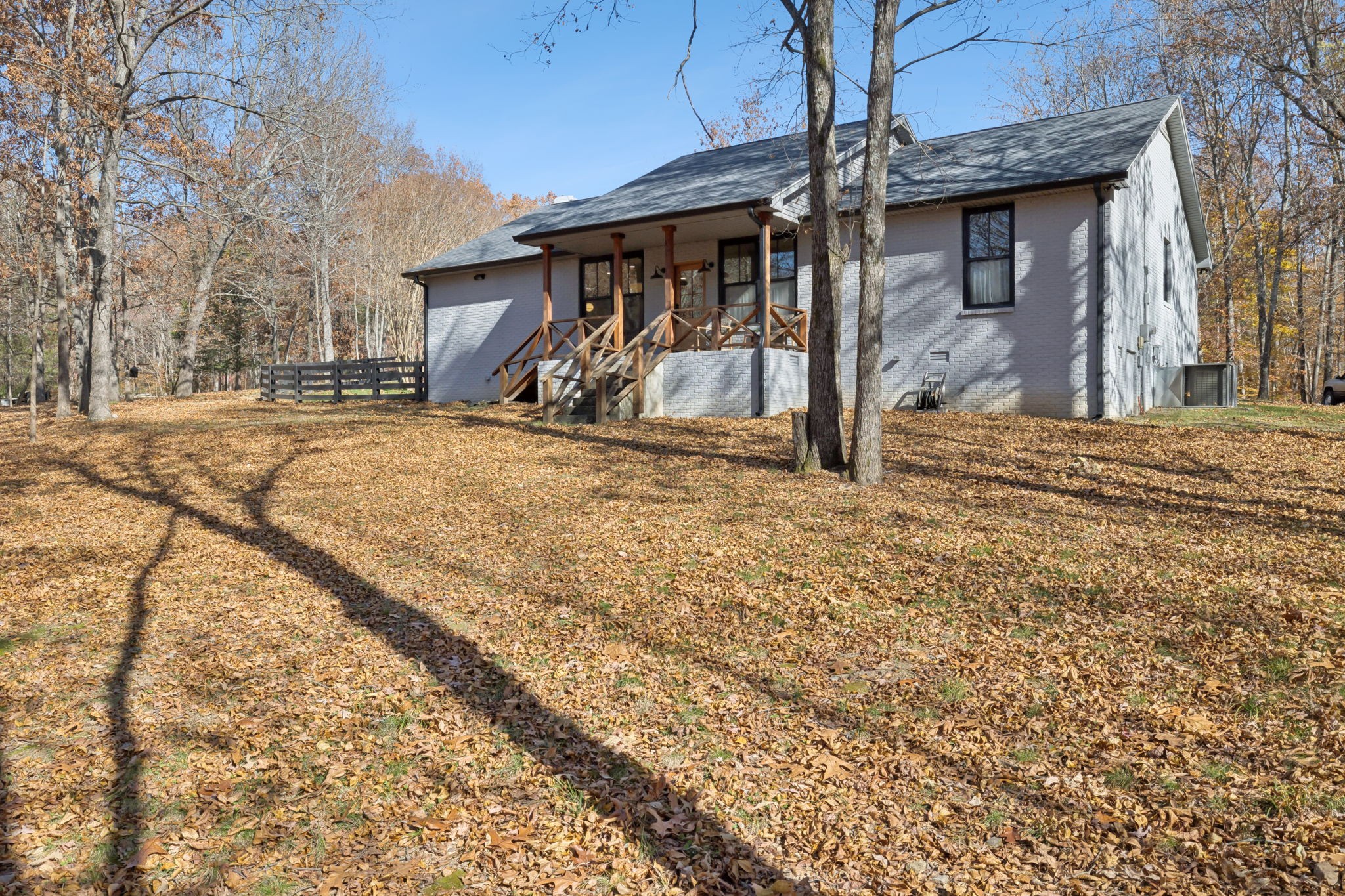 7340 Bradford Road Primm Springs, TN 38476 - Photo 4 of 36 a view of a house with snow on the road