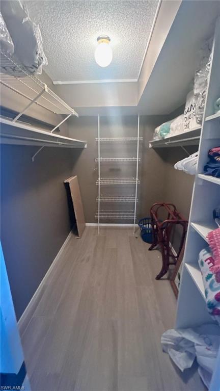 200 Pebble Beach Boulevard, Unit D402 Naples, FL 34113 - Photo 8 of 11 a view of a room with gym equipment