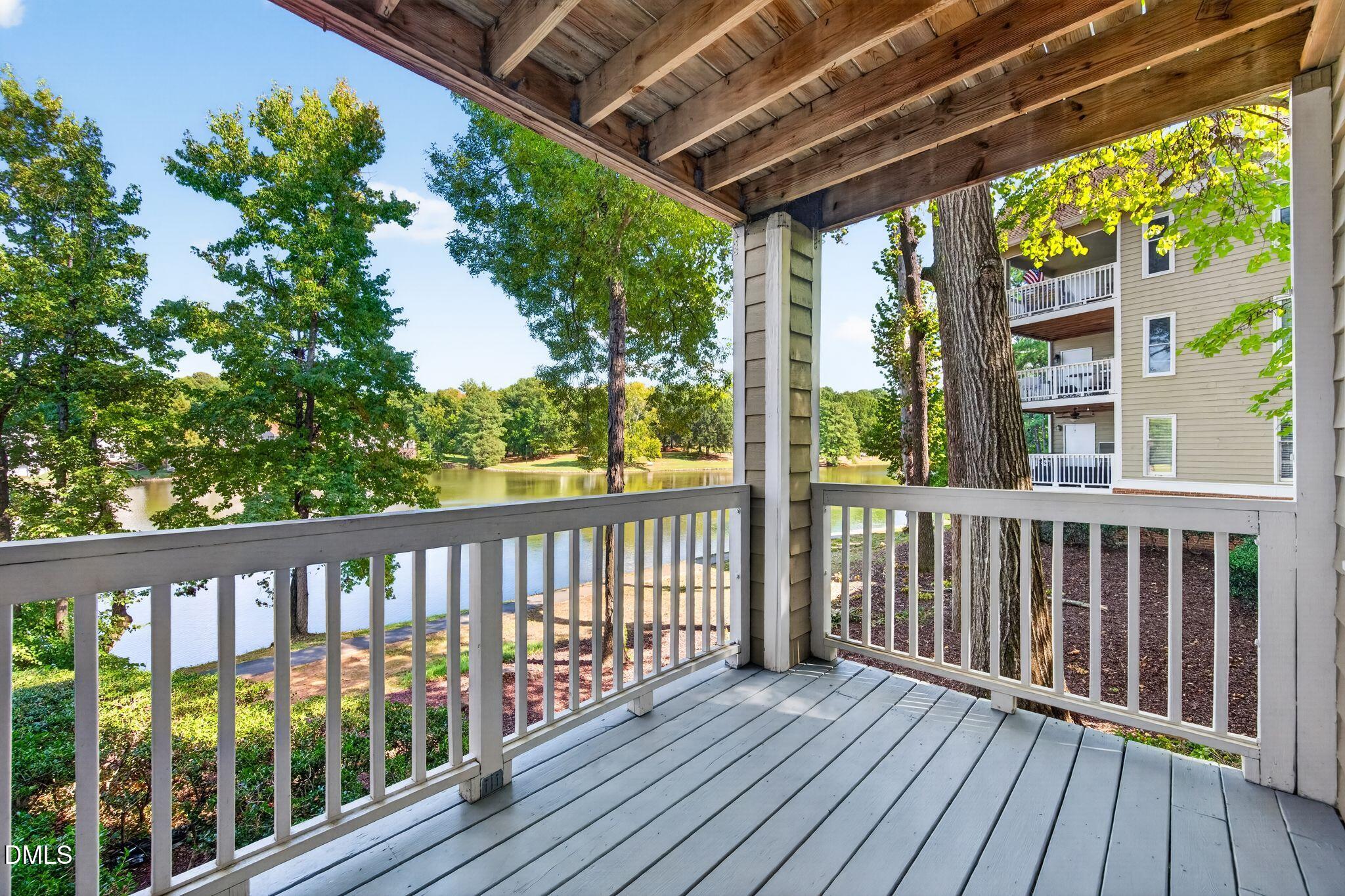 512 Springfork Drive Cary, NC 27513 - Photo 12 of 43 Deck/Balcony overlooking the lake