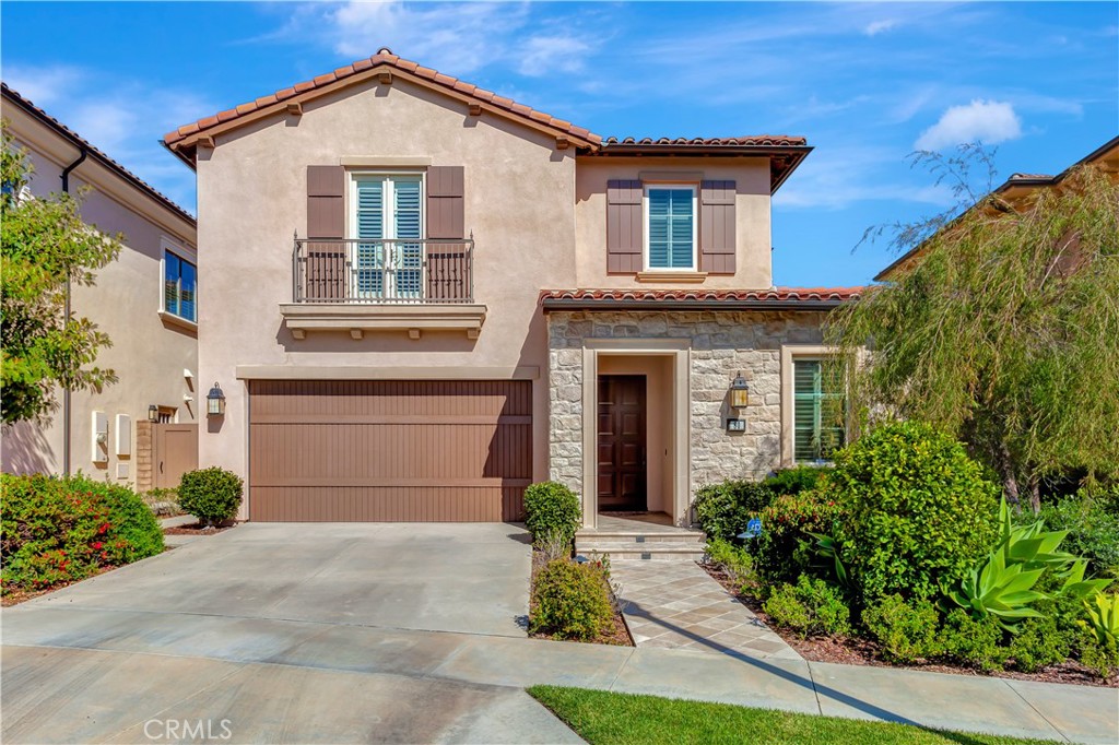 80 Stagecoach Irvine, CA 92602 - Photo 1 of 1 a front view of a house with garden