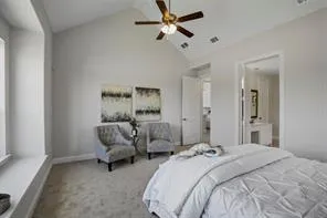 a bed room with a bed and a chandelier