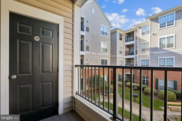 a view of parking garage with cars