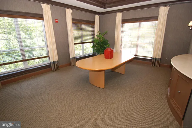 a front view of a building with garden