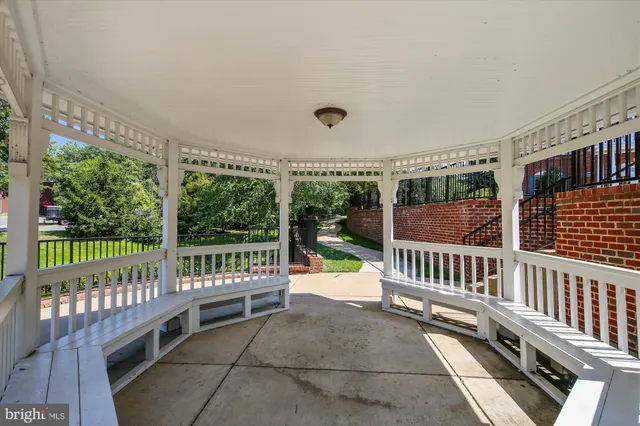 a view of yard with patio