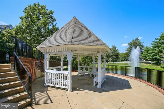 a view of a park with large trees