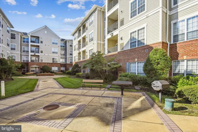 a sign that is in front of flowers