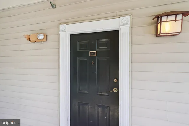 a view of entryway with wooden floor