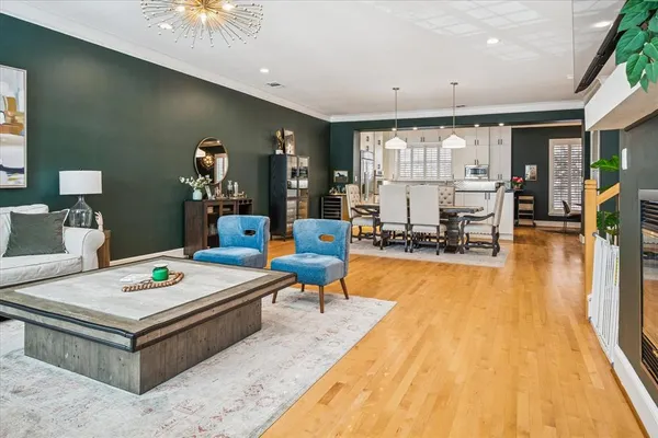 a living room with furniture and a table