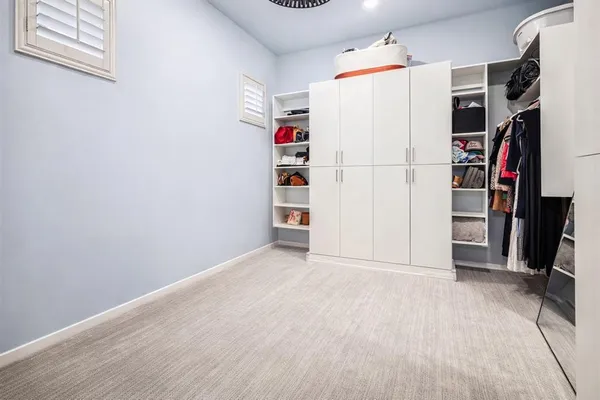 a white refrigerator freezer sitting inside of a kitchen