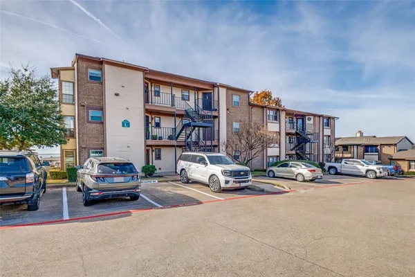 a car parked in front of a building