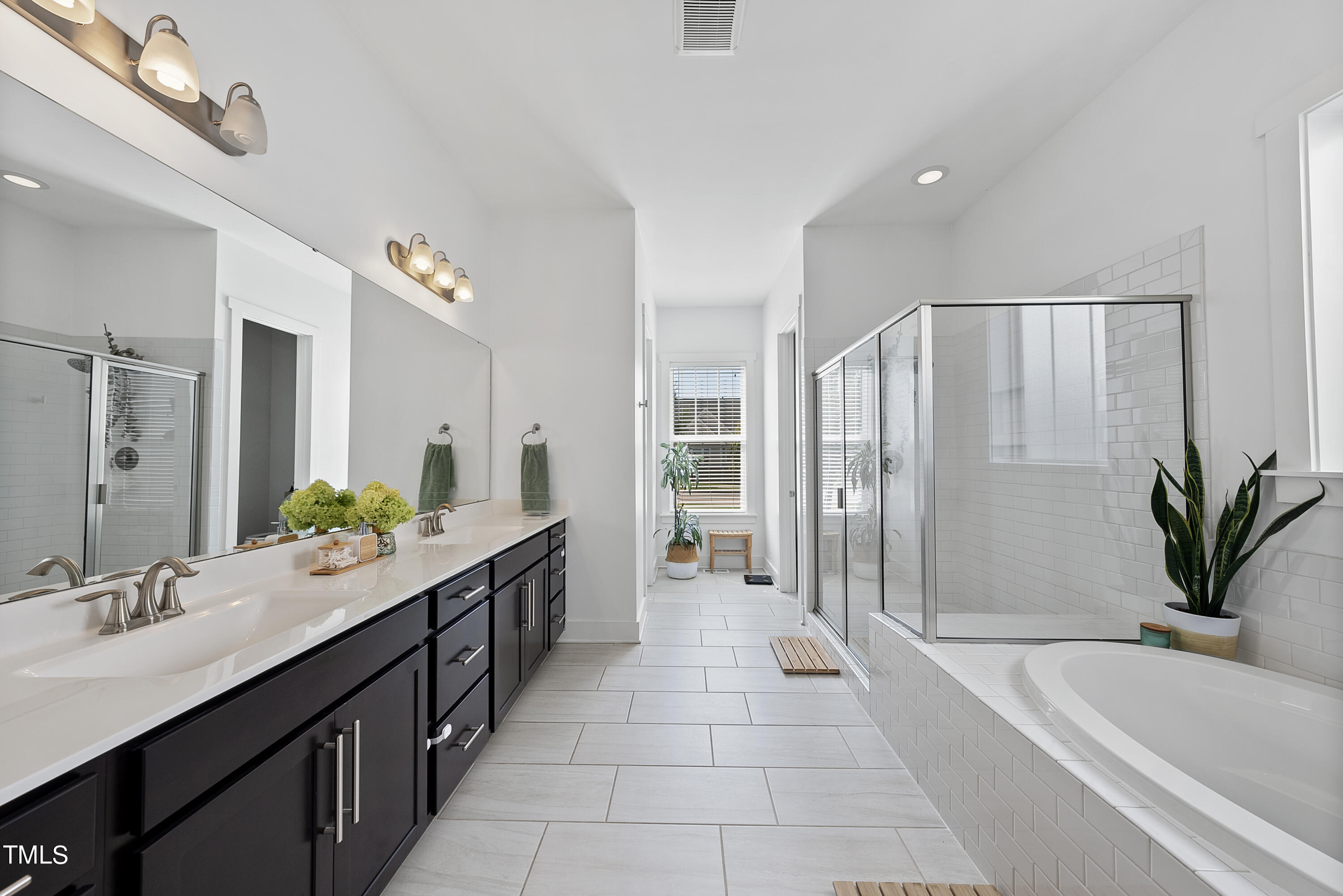 5205 Beckom Street Raleigh, NC 27616 - Photo 17 of 37 Primary bath is spa like retreat