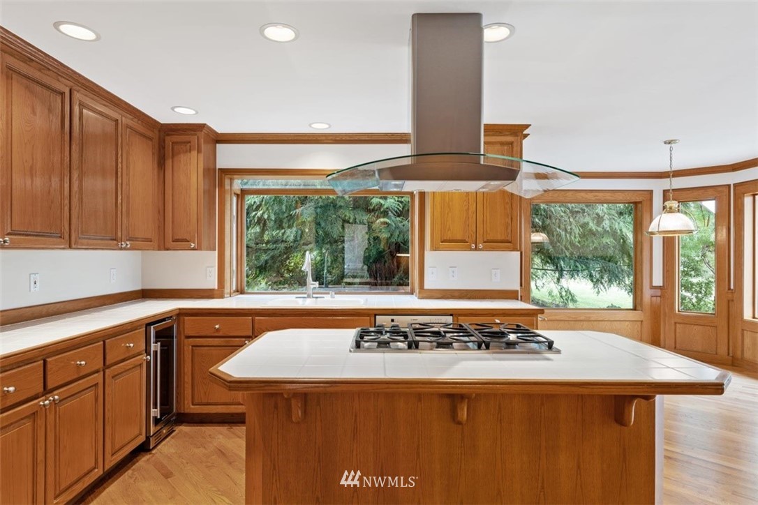 4801 166th Place Southeast Bothell, WA 98012 - Photo 11 of 40 a view of a kitchen with a sink and large window